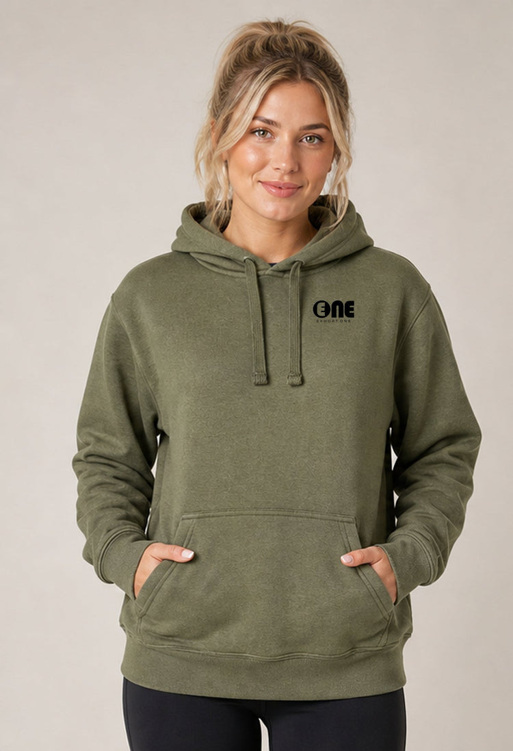 A woman wearing an olive green pullover hoodie with a black 'one' logo on the left chest, standing against a neutral beige background.