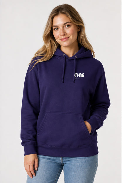 A woman wearing a dark purple pullover hoodie with a white 'ONE' logo on the left chest, paired with light blue jeans, photographed against a light gray studio background.