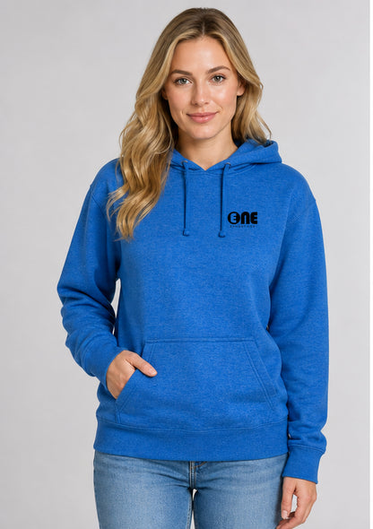 A woman wearing a bright blue heather pullover hoodie with a black 'ONE' logo on the left chest, paired with light blue jeans, photographed against a neutral gray studio background.